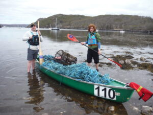 collecting litter by kayak gairloch